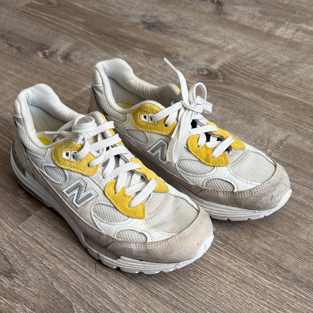New Balance Sneakers in Cream and Yellow. Has some light wear and tear.
